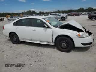 2012 Chevrolet Impala Police Police with VIN 2G1WD5E32C1233829, listed as a Copart auction lot 70190245 with Not provided miles and Salvage title. Bid and sale history available at DreamBid. Image 4.
