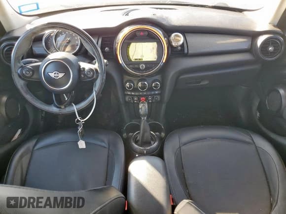 ✅ 2015 MINI Hardtop 4 Door • VIN: WMWXS5C5XFT830034 • Lot: 91065925. Wystawiony na Copart z przebiegiem 127 893 mil. Bezpłatny archiwum sprzedaży aukcyjnych z USA i szczegółowy raport historii pojazdu na DreamBid. Zdjęcie 8.