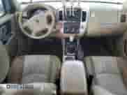 2006 Mercury Mariner Luxury with VIN 4M2CU56136DJ00202, listed as a Copart auction lot 85121264 with 103,242 mi miles and Salvage title. Bid and sale history available at DreamBid. Image 8.