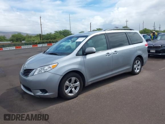 ✅ 2014 Toyota Sienna LE AAS • VIN: 5TDKK3DC0ES467867 • Lot: 42022676. Listed on IAAI with 99,959 mi. Free auction sales archive from the USA and detailed vehicle history report at DreamBid. Image 2.