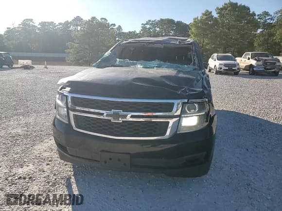 ✅ 2015 Chevrolet Suburban LT • VIN: 1GNSCJKC7FR640103 • Lot: 92284075. Listed on Copart with 221,886 mi. Free auction sales archive from the USA and detailed vehicle history report at DreamBid. Image 14.