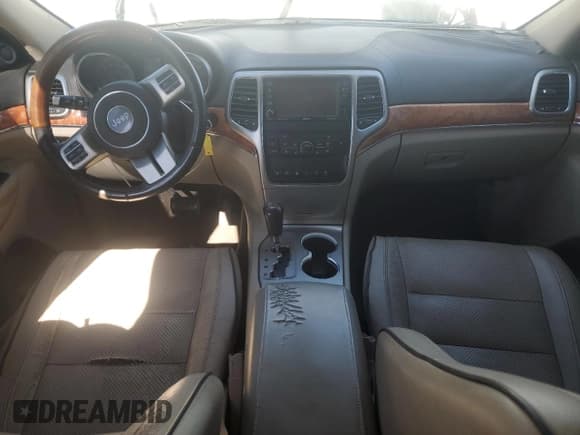 ✅ 2011 Jeep Grand Cherokee Overland • VIN: 1J4RR6GT7BC604866 • Lot: 91003765. Listed on Copart with 128,314 mi. Free auction sales archive from the USA and detailed vehicle history report at DreamBid. Image 8.
