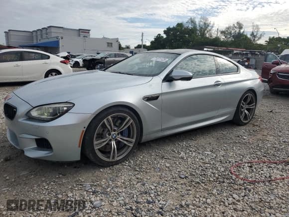 ✅ 2013 BMW M6 • VIN: WBSLX9C56DD159892 • Lot: 71371125. Listed on Copart with 90,813 mi. Free auction sales archive from the USA and detailed vehicle history report at DreamBid. Image 1.