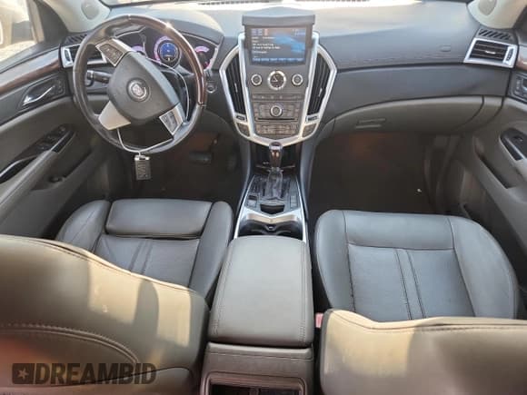 ✅ 2012 Cadillac SRX Performance Collection • VIN: 3GYFNBE36CS582753 • Lot: 70907965. Listed on Copart with 85,563 mi. Free auction sales archive from the USA and detailed vehicle history report at DreamBid. Image 8.