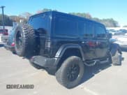 ✅ 2019 Jeep Wrangler Unlimited Sahara • VIN: 1C4HJXEG1KW572693 • Lot: 43697259. Listed on IAAI with 42,087 mi. Free auction sales archive from the USA and detailed vehicle history report at DreamBid. Image 4.