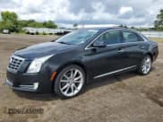 ✅ 2014 Cadillac XTS Premium • VIN: 2G61R5S38E9215110 • Лот: 68746295. Опубликован ранее на Copart с пробегом 77 342 миль. Бесплатный доступ к архиву аукционных продаж из США и подробный отчёт об истории автомобиля на DreamBid. Изображение 1.
