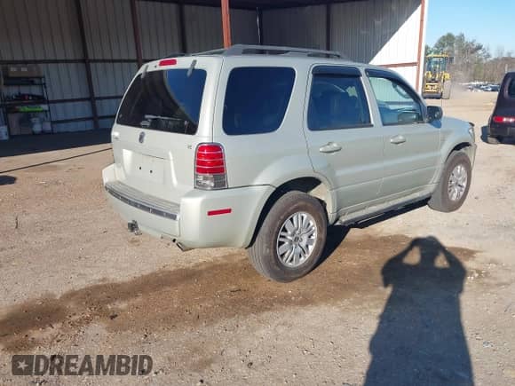 2005 Mercury Mariner Luxury z VIN 4M2YU56165DJ12462, wystawiony jako IAAI lot #41701579 z przebiegiem 252 874 mil mil oraz . Historia ofert i sprzedaży dostępna na DreamBid. Obrazek 4.