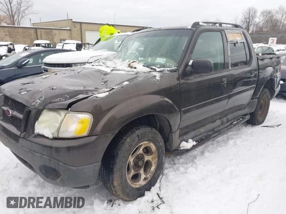 ✅ 2005 Ford Explorer Sport Trac XLS • VIN: 1FMZU67KX5UA71613 • Lot: 43821495. Listed on IAAI with 239,645 mi. Free auction sales archive from the USA and detailed vehicle history report at DreamBid. Image 2.