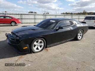 ✅ 2013 Dodge Challenger R/T Plus • VIN: 2C3CDYBTXDH705028 • Lot: 79052844. Wystawiony na Copart z przebiegiem 132 433 mil. Bezpłatny archiwum sprzedaży aukcyjnych z USA i szczegółowy raport historii pojazdu na DreamBid. Zdjęcie 1.