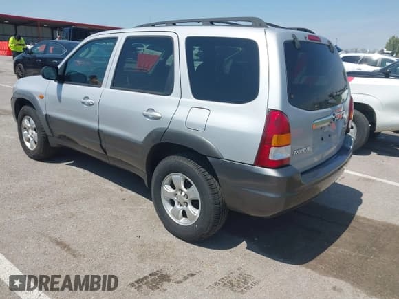 ✅ 2003 Mazda Tribute LX • VIN: 4F2YZ04173KM54833 • Лот: 42074524. Опубликован ранее на IAAI с пробегом 232 848 миль. Бесплатный доступ к архиву аукционных продаж из США и подробный отчёт об истории автомобиля на DreamBid. Изображение 3.