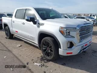 ✅ 2021 GMC Sierra 1500 Denali • VIN: 1GTU9FET3MZ308682 • Лот: 41093456. Опубликован ранее на IAAI с пробегом 64 909 миль. Бесплатный доступ к архиву аукционных продаж из США и подробный отчёт об истории автомобиля на DreamBid. Изображение 1.