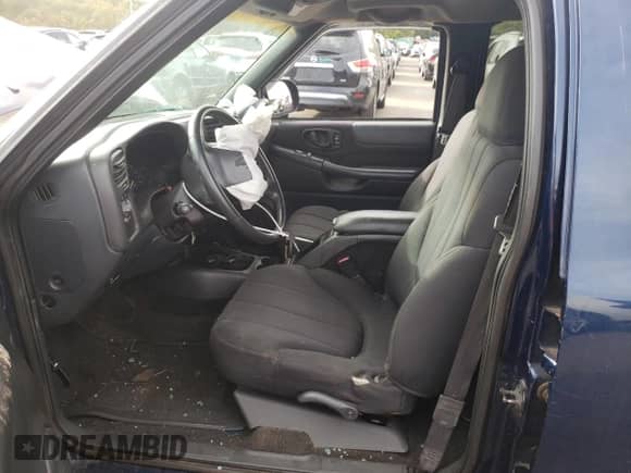 2003 Chevrolet S-10 LS z VIN 1GCDT13X53K125186, wystawiony jako Copart lot #72440074 z przebiegiem Nie podano mil oraz Szkoda całkowita • Salvage title. Historia ofert i sprzedaży dostępna na DreamBid. Obrazek 7.