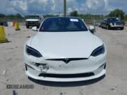✅ 2022 Tesla Model S Plaid • VIN: 5YJSA1E66NF477596 • Лот: 42944171. Опубликован ранее на IAAI с пробегом 30 265 миль. Бесплатный доступ к архиву аукционных продаж из США и подробный отчёт об истории автомобиля на DreamBid. Изображение 12.