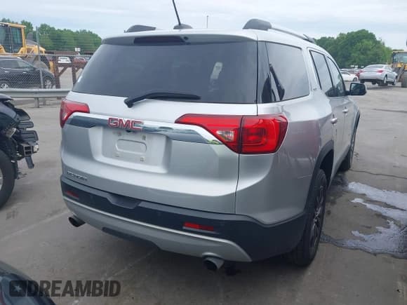 ✅ 2017 GMC Acadia SLT • VIN: 1GKKNMLS8HZ184064 • Lot: 42113172. Listed on IAAI with 118,769 mi. Free auction sales archive from the USA and detailed vehicle history report at DreamBid. Image 4.
