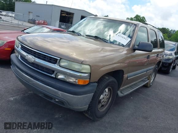 ✅ 2003 Chevrolet Tahoe LT • VIN: 1GNEC13Z43R161990 • Lot: 42242612. Listed on IAAI with 236,997 mi. Free auction sales archive from the USA and detailed vehicle history report at DreamBid. Image 2.