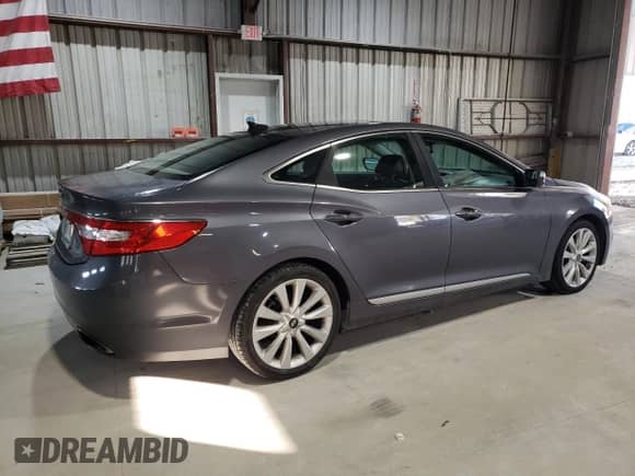 2012 Hyundai Azera с VIN KMHFH4JG9CA149457, выставлен на аукционе Copart как лот 80134214 с пробегом 93 012 миль миль и Списание • Salvage title. История ставок и продаж доступна на DreamBid. Изображение 3.