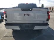 ✅ 2024 Ford F-150 Lightning XLT • VIN: 1FTVW3LK5RWG08464 • Lot: 85395485. Listed on Copart with 8,145 mi. Free auction sales archive from the USA and detailed vehicle history report at DreamBid. Image 6.