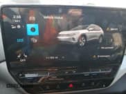 ✅ 2023 Volkswagen ID.4 Pro S Plus • VIN: 1V2HMPE87PC058337 • Lot: 42829765. Wystawiony na Copart z przebiegiem 11 783 mil. Bezpłatny archiwum sprzedaży aukcyjnych z USA i szczegółowy raport historii pojazdu na DreamBid. Zdjęcie 9.