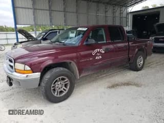 ✅ 2001 Dodge Dakota Sport • VIN: 1B7GG2AN21S104169 • Lot: 67199295. Wystawiony na Copart z przebiegiem 233 541 mil. Bezpłatny archiwum sprzedaży aukcyjnych z USA i szczegółowy raport historii pojazdu na DreamBid. Zdjęcie 1.