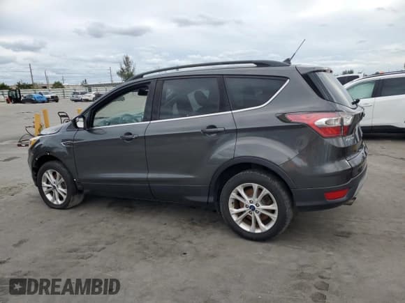 ✅ 2018 Ford Escape SE • VIN: 1FMCU9GD4JUB78837 • Лот: 91487925. Опубликован ранее на Copart с пробегом 95 502 миль. Бесплатный доступ к архиву аукционных продаж из США и подробный отчёт об истории автомобиля на DreamBid. Изображение 2.