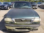 ✅ 2002 Mazda B-Series SE • VIN: 4F4YR16D72TM26706 • Lot: 70552984. Wystawiony na Copart z przebiegiem 103 479 mil. Bezpłatny archiwum sprzedaży aukcyjnych z USA i szczegółowy raport historii pojazdu na DreamBid. Zdjęcie 5.