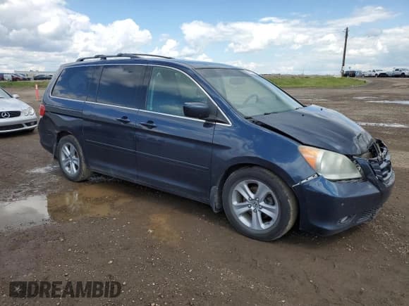 ✅ 2010 Honda Odyssey • VIN: 5FNRL3H81AB507082 • Лот: 62931535. Опубликован ранее на Copart с пробегом 328 109 миль. Бесплатный доступ к архиву аукционных продаж из США и подробный отчёт об истории автомобиля на DreamBid. Изображение 4.