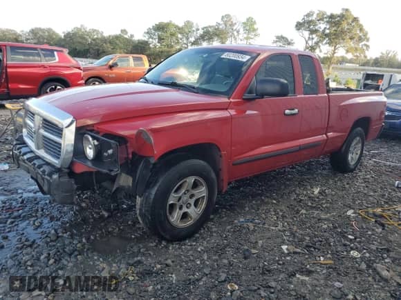 2006 Dodge Dakota SLT with VIN 1D7HE42N76S501233, listed as a Copart auction lot 80200934 with 281,599 mi miles and Salvage title. Bid and sale history available at DreamBid. Image 1.