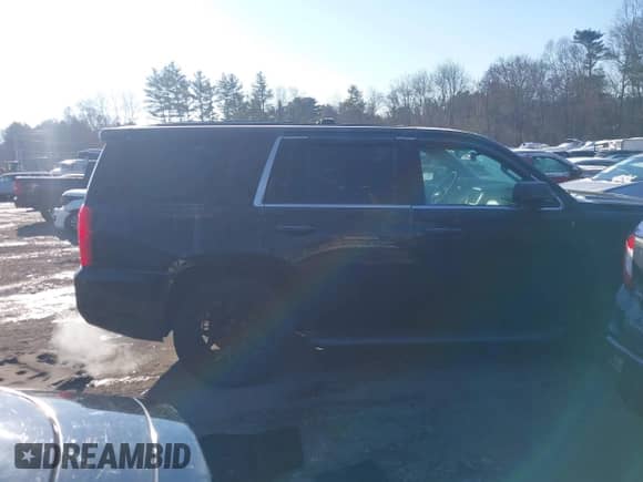 2016 Chevrolet Tahoe Commercial with VIN 1GNSKDEC9GR137688, listed as a IAAI auction lot 41387125 with 115,721 mi miles and . Bid and sale history available at DreamBid. Image 13.