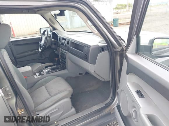 ✅ 2007 Jeep Commander Sport • VIN: 1J8HG48P27C589142 • Lot: 42379721. Listed on IAAI with 162,397 mi. Free auction sales archive from the USA and detailed vehicle history report at DreamBid. Image 5.