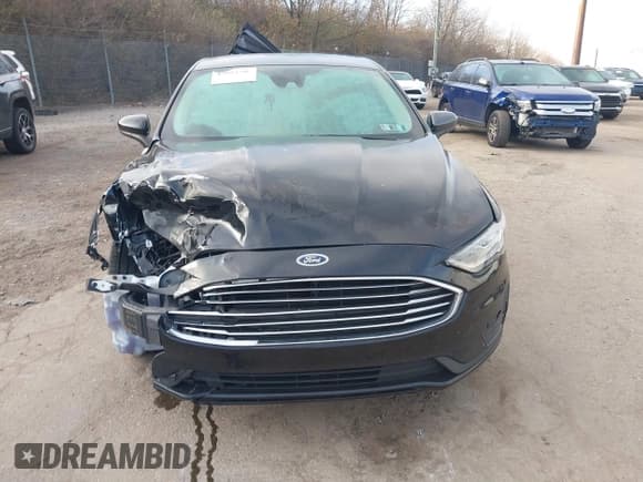 ✅ 2020 Ford Fusion SE • VIN: 3FA6P0T96LR156148 • Lot: 43883289. Listed on IAAI with 81,021 mi. Free auction sales archive from the USA and detailed vehicle history report at DreamBid. Image 13.