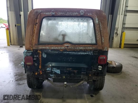 ✅ 1984 Jeep CJ • VIN: 1JCCM87E8ET005565 • Lot: 82138595. Listed on Copart with 82,667 mi. Free auction sales archive from the USA and detailed vehicle history report at DreamBid. Image 6.