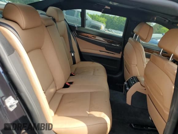 ✅ 2014 BMW 7 Series 740i • VIN: WBAYA6C57ED826660 • Lot: 59566945. Listed on Copart with 95,828 mi. Free auction sales archive from the USA and detailed vehicle history report at DreamBid. Image 10.