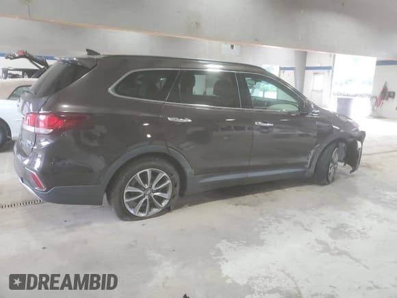 ✅ 2017 Hyundai Santa Fe SE • VIN: KM8SMDHF5HU217105 • Lot: 81822215. Listed on Copart with 118,935 mi. Free auction sales archive from the USA and detailed vehicle history report at DreamBid. Image 3.