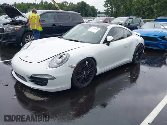 ✅ 2014 Porsche 911 Carrera • VIN: WP0AA2A91ES106639 • Lot: 42964632. Listed on IAAI with 67,429 mi. Free auction sales archive from the USA and detailed vehicle history report at DreamBid. Image 2.