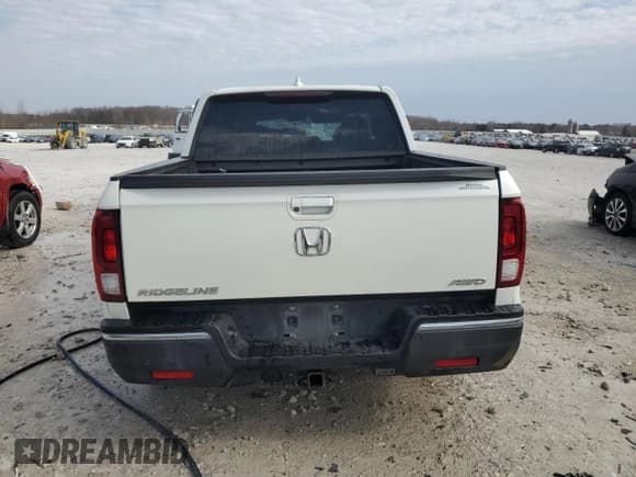 ✅ 2018 Honda Ridgeline RTL-T • VIN: 5FPYK3F69JB014290 • Lot: 53443965. Listed on Copart with 99,000 mi. Free auction sales archive from the USA and detailed vehicle history report at DreamBid. Image 6.