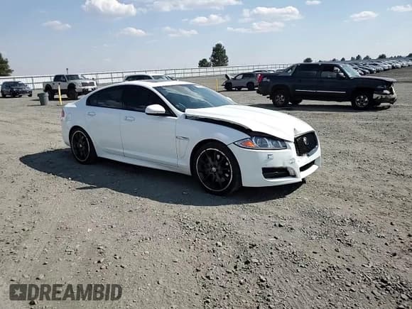 ✅ 2015 Jaguar XF Portfolio • VIN: SAJWJ0FF1F8U68785 • Лот: 70933925. Опубликован ранее на Copart с пробегом 136 272 миль. Бесплатный доступ к архиву аукционных продаж из США и подробный отчёт об истории автомобиля на DreamBid. Изображение 13.