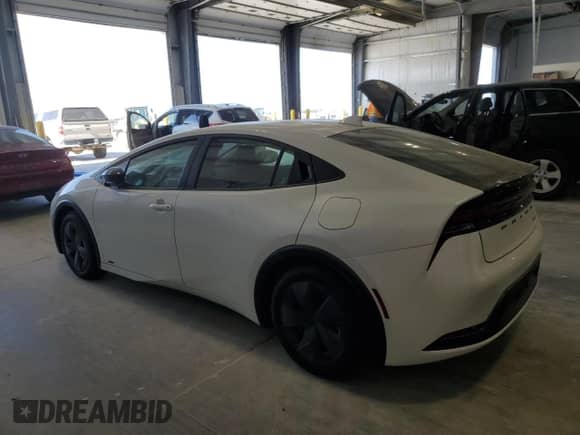 2024 Toyota Prius Limited with VIN JTDADABU9R3017082, listed as a Copart auction lot 85710085 with 9,983 mi miles and Salvage title. Bid and sale history available at DreamBid. Image 2.