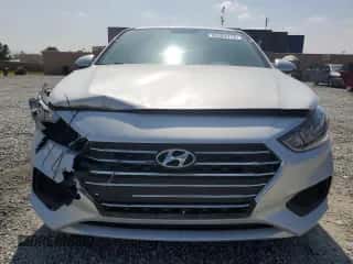 2020 Hyundai Accent SE с VIN 3KPC24A69LE123275, выставлен на аукционе Copart как лот 55763774 с пробегом 18 618 миль миль и Списание • Salvage title. История ставок и продаж доступна на DreamBid. Изображение 5.