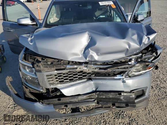 ✅ 2015 Chevrolet Suburban LT • VIN: 1GNSKJKC2FR645650 • Lot: 76147464. Wystawiony na Copart z przebiegiem 141 679 mil. Bezpłatny archiwum sprzedaży aukcyjnych z USA i szczegółowy raport historii pojazdu na DreamBid. Zdjęcie 13.