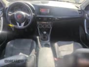 ✅ 2013 Mazda CX-5 Sport • VIN: JM3KE2BE1D0120692 • Lot: 68158835. Listed on Copart with 142,436 mi. Free auction sales archive from the USA and detailed vehicle history report at DreamBid. Image 8.