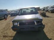 ✅ 1994 Mitsubishi Mighty Max • VIN: JA7LS21G4RP009588 • Лот: 60519834. Опубликован ранее на Copart с пробегом 123 918 миль. Бесплатный доступ к архиву аукционных продаж из США и подробный отчёт об истории автомобиля на DreamBid. Изображение 11.