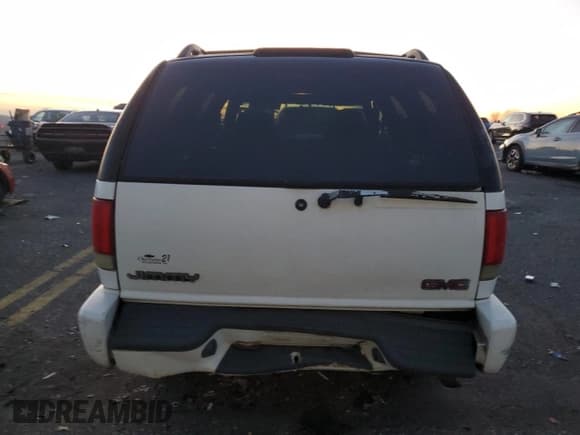 ✅ 1998 GMC Jimmy SLS • VIN: 1GKDT13W9W2506846 • Lot: 84854964. Listed on Copart with 151,051 mi. Free auction sales archive from the USA and detailed vehicle history report at DreamBid. Image 6.