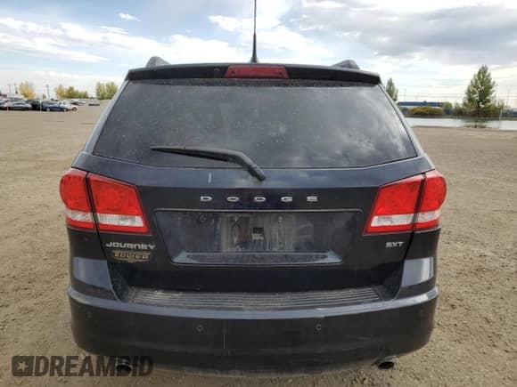 2011 Dodge Journey SXT с VIN 3D4PG5FG7BT511287, выставлен на аукционе Copart как лот 84292705 с пробегом 155 732 миль миль и Списание • Salvage title. История ставок и продаж доступна на DreamBid. Изображение 6.