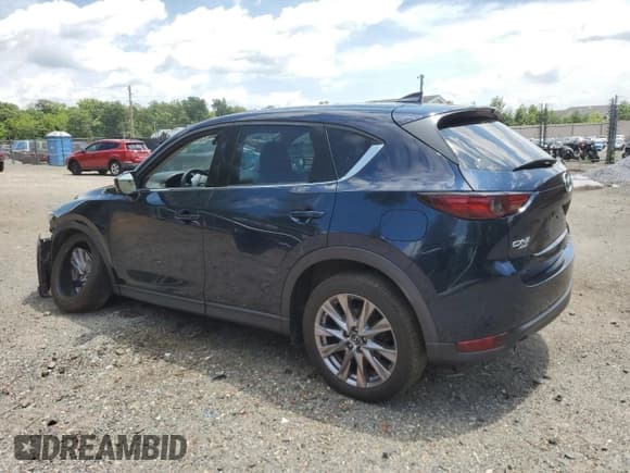 ✅ 2019 Mazda CX-5 Grand Touring • VIN: JM3KFBDMXK1639376 • Lot: 65414215. Listed on Copart with 63,202 mi. Free auction sales archive from the USA and detailed vehicle history report at DreamBid. Image 2.