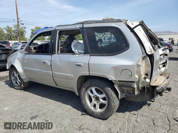 ✅ 2004 GMC Envoy SLE • VIN: 1GKDT13S242261298 • Лот: 59995905. Опубликован ранее на Copart с пробегом Не указан. Бесплатный доступ к архиву аукционных продаж из США и подробный отчёт об истории автомобиля на DreamBid. Изображение 2.