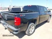 ✅ 2018 Chevrolet Silverado 1500 LT • VIN: 3GCUKREC6JG157211 • Lot: 43294441. Wystawiony na IAAI z przebiegiem 70 182 mil. Bezpłatny archiwum sprzedaży aukcyjnych z USA i szczegółowy raport historii pojazdu na DreamBid. Zdjęcie 4.