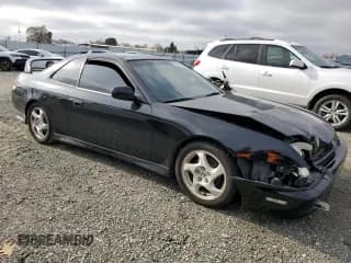 ✅ 2001 Honda Prelude • VIN: JHMBB62461C002744 • Лот: 84906114. Опубликован ранее на Copart с пробегом 218 903 миль. Бесплатный доступ к архиву аукционных продаж из США и подробный отчёт об истории автомобиля на DreamBid. Изображение 4.