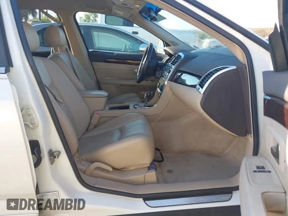 ✅ 2009 Cadillac SRX RWD • VIN: 1GYEE637490121768 • Lot: 43765198. Wystawiony na IAAI z przebiegiem 122 739 mil. Bezpłatny archiwum sprzedaży aukcyjnych z USA i szczegółowy raport historii pojazdu na DreamBid. Zdjęcie 5.