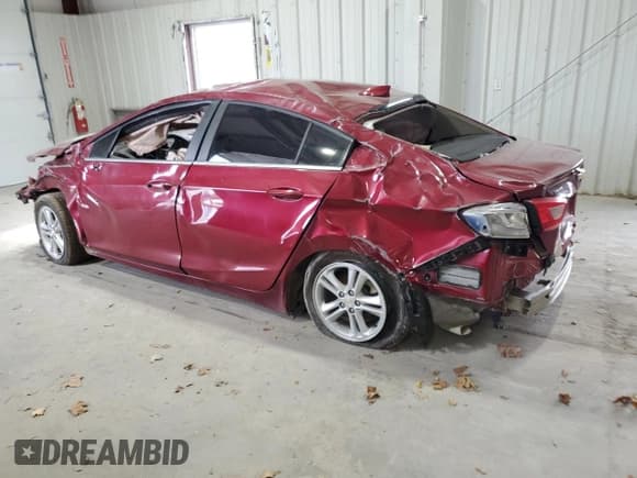 ✅ 2018 Chevrolet Cruze LT • VIN: 1G1BE5SM7J7155136 • Lot: 92058695. Listed on Copart with 131,714 mi. Free auction sales archive from the USA and detailed vehicle history report at DreamBid. Image 2.