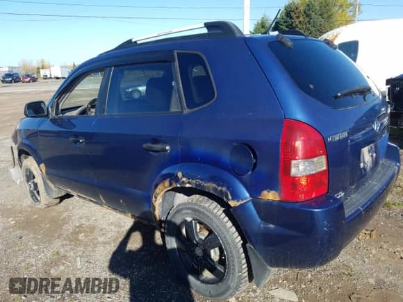 2006 Hyundai Tucson GL z VIN KM8JM72B76U405771, wystawiony jako Copart lot #76751074 z przebiegiem 233 649 mil mil oraz Szkoda całkowita • Salvage title. Historia ofert i sprzedaży dostępna na DreamBid. Obrazek 2.